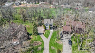 Nestled in the picturesque Lake Doster community This 2 story on Lake Doster Golf Club in Michigan - for sale on GolfHomes.com, golf home, golf lot