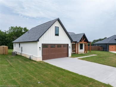 Beautiful new construction in Greenwood's newest and most on Vache-Grasse Country Club in Arkansas - for sale on GolfHomes.com, golf home, golf lot