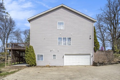 Nestled in the picturesque Lake Doster community This 2 story on Lake Doster Golf Club in Michigan - for sale on GolfHomes.com, golf home, golf lot