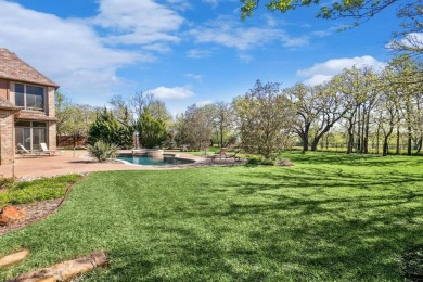 Flower Mound serenity! This stunning home sits on 1.2 acres in on Tour 18 Golf Course Dallas in Texas - for sale on GolfHomes.com, golf home, golf lot