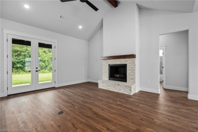 Beautiful new construction in Greenwood's newest and most on Vache-Grasse Country Club in Arkansas - for sale on GolfHomes.com, golf home, golf lot