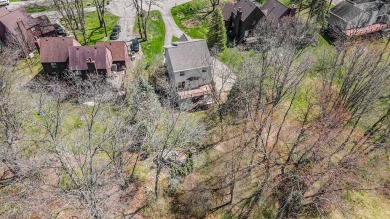 Nestled in the picturesque Lake Doster community This 2 story on Lake Doster Golf Club in Michigan - for sale on GolfHomes.com, golf home, golf lot