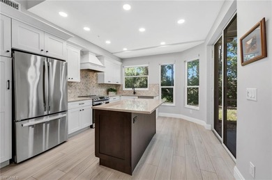 Stunning first floor end-unit carriage home with serene preserve on Pelicans Nest Golf Club in Florida - for sale on GolfHomes.com, golf home, golf lot