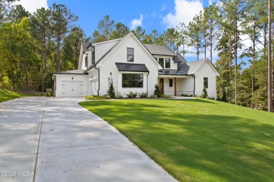 STUNNING home in the beautiful gated subdivision, River Forest on The Club River Forest in Georgia - for sale on GolfHomes.com, golf home, golf lot