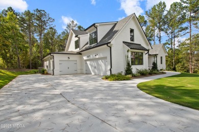 STUNNING home in the beautiful gated subdivision, River Forest on The Club River Forest in Georgia - for sale on GolfHomes.com, golf home, golf lot