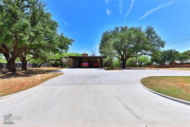 Mid-century modern commercial office on large lot. Located near on Abilene Country Club - South Course in Texas - for sale on GolfHomes.com, golf home, golf lot