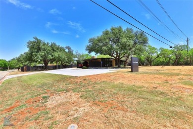 Mid-century modern commercial office on large lot. Located near on Abilene Country Club - South Course in Texas - for sale on GolfHomes.com, golf home, golf lot