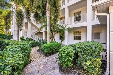 Gorgeous, bright, first floor, 3/2 end-unit with serene preserve on Bonita Bay West in Florida - for sale on GolfHomes.com, golf home, golf lot