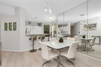 Gorgeous, bright, first floor, 3/2 end-unit with serene preserve on Bonita Bay West in Florida - for sale on GolfHomes.com, golf home, golf lot