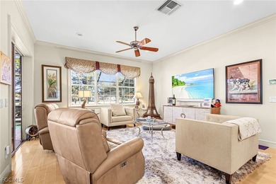 Immerse yourself in this exceptional furnished residence in on Fiddlesticks Country Club in Florida - for sale on GolfHomes.com, golf home, golf lot