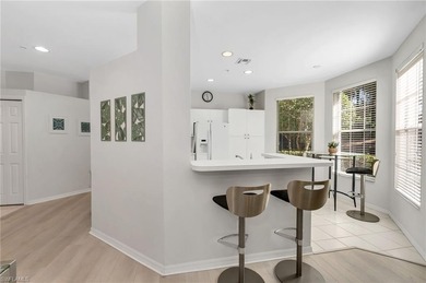 Gorgeous, bright, first floor, 3/2 end-unit with serene preserve on Bonita Bay West in Florida - for sale on GolfHomes.com, golf home, golf lot