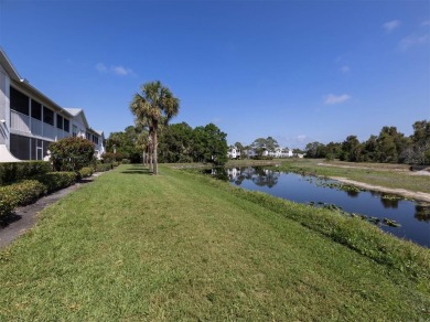 Beautiful Waterside Village condo with wonderful water and on Pelican Pointe Golf and Country Club in Florida - for sale on GolfHomes.com, golf home, golf lot