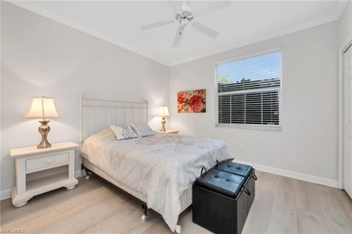 Gorgeous, bright, first floor, 3/2 end-unit with serene preserve on Bonita Bay West in Florida - for sale on GolfHomes.com, golf home, golf lot