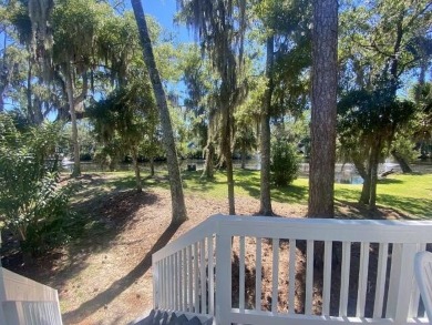 Highly sought-after end unit 2 story townhome overlooking scenic on The Plantation Course At Edisto in South Carolina - for sale on GolfHomes.com, golf home, golf lot