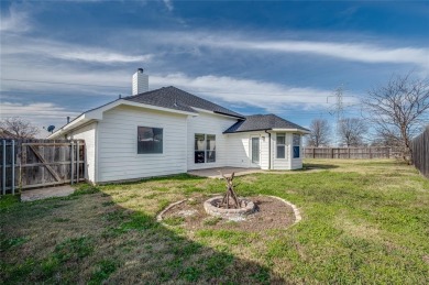 This light and bright corner lot home has been updated to offer on Mansfield National Golf Club in Texas - for sale on GolfHomes.com, golf home, golf lot