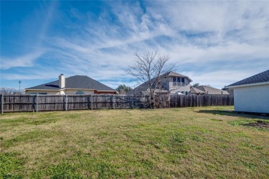 This light and bright corner lot home has been updated to offer on Mansfield National Golf Club in Texas - for sale on GolfHomes.com, golf home, golf lot