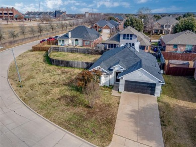 This light and bright corner lot home has been updated to offer on Mansfield National Golf Club in Texas - for sale on GolfHomes.com, golf home, golf lot