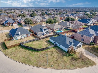 This light and bright corner lot home has been updated to offer on Mansfield National Golf Club in Texas - for sale on GolfHomes.com, golf home, golf lot