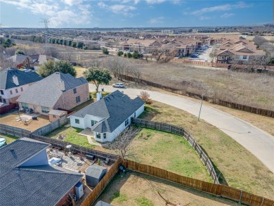 This light and bright corner lot home has been updated to offer on Mansfield National Golf Club in Texas - for sale on GolfHomes.com, golf home, golf lot