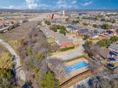 This light and bright corner lot home has been updated to offer on Mansfield National Golf Club in Texas - for sale on GolfHomes.com, golf home, golf lot