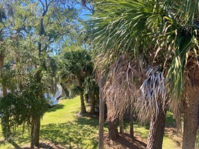 Highly sought-after end unit 2 story townhome overlooking scenic on The Plantation Course At Edisto in South Carolina - for sale on GolfHomes.com, golf home, golf lot