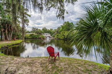 Highly sought-after end unit 2 story townhome overlooking scenic on The Plantation Course At Edisto in South Carolina - for sale on GolfHomes.com, golf home, golf lot