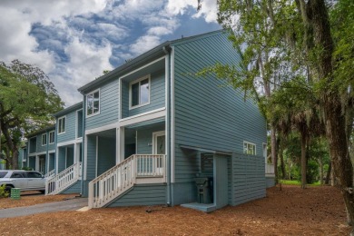 Highly sought-after end unit 2 story townhome overlooking scenic on The Plantation Course At Edisto in South Carolina - for sale on GolfHomes.com, golf home, golf lot