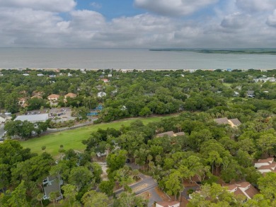 Highly sought-after end unit 2 story townhome overlooking scenic on The Plantation Course At Edisto in South Carolina - for sale on GolfHomes.com, golf home, golf lot