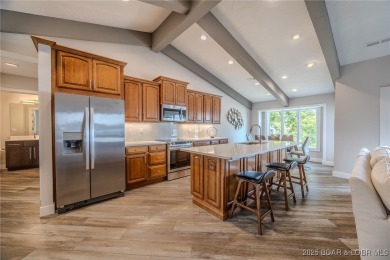 This exceptional 2 bedroom, 2 bath condo has been thoughtfully on Seasons Ridge At Four Seasons in Missouri - for sale on GolfHomes.com, golf home, golf lot