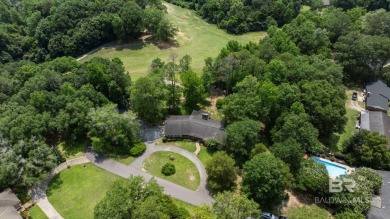 Welcome to this beautifully updated brick ranch nestled on a on Vanity Fair Golf and Tennis Club in Alabama - for sale on GolfHomes.com, golf home, golf lot