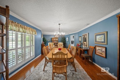 Welcome to this beautifully updated brick ranch nestled on a on Vanity Fair Golf and Tennis Club in Alabama - for sale on GolfHomes.com, golf home, golf lot