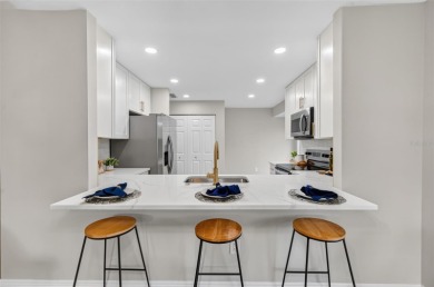Stunning remodel with golf course frontage in Meadows. New roof on The Meadows Golf and Country Club in Florida - for sale on GolfHomes.com, golf home, golf lot