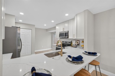 Stunning remodel with golf course frontage in Meadows. New roof on The Meadows Golf and Country Club in Florida - for sale on GolfHomes.com, golf home, golf lot