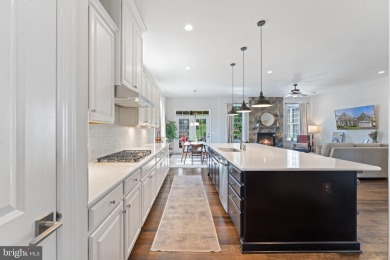 Enjoy main level living in the sought after Dominion Valley on Dominion Valley Country Club in Virginia - for sale on GolfHomes.com, golf home, golf lot