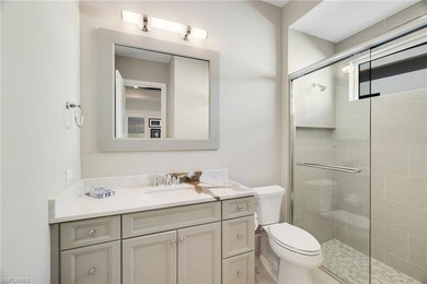 Experience refined waterfront living within the gates of Miromar on Miromar Lakes Golf Club in Florida - for sale on GolfHomes.com, golf home, golf lot