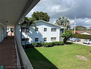 Come see it now! Corner  2nd floor 1 br/1.5 bth with CENTRAL A/C on Hillsboro Pines Golf in Florida - for sale on GolfHomes.com, golf home, golf lot