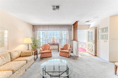 This charming Buttonwood model is a 2-bedroom, 2-bathroom 2-car on Timber Pines Golf Course in Florida - for sale on GolfHomes.com, golf home, golf lot