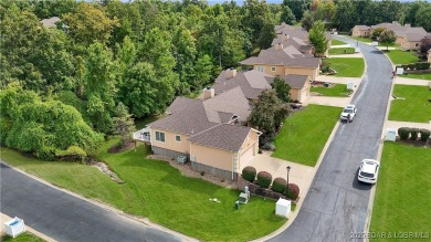 An absolute must-see, professionally decorated and furnished by on The Club At Porto Cima in Missouri - for sale on GolfHomes.com, golf home, golf lot