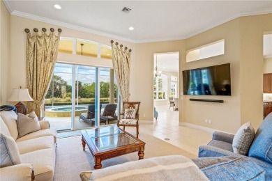 Step into serenity at this lakeside paradise nestled within the on Oak Harbor Country Club in Florida - for sale on GolfHomes.com, golf home, golf lot