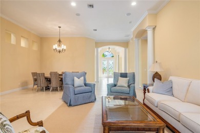 Step into serenity at this lakeside paradise nestled within the on Oak Harbor Country Club in Florida - for sale on GolfHomes.com, golf home, golf lot