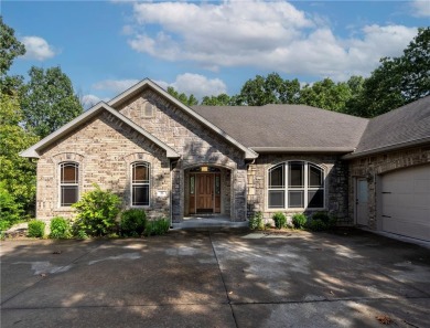 Beautifully landscaped and surrounded by mature trees! This on Bella Vista - Metfield Golf Complex and Country Club in Arkansas - for sale on GolfHomes.com, golf home, golf lot