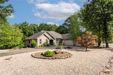 Beautifully landscaped and surrounded by mature trees! This on Bella Vista - Metfield Golf Complex and Country Club in Arkansas - for sale on GolfHomes.com, golf home, golf lot