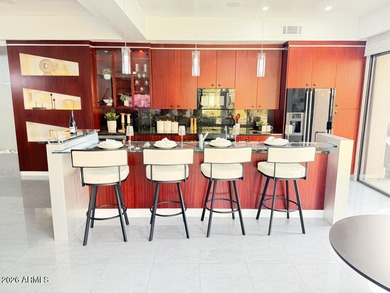 Exceptional waterfront residence in the prestigious gated on Gainey Ranch Golf Club in Arizona - for sale on GolfHomes.com, golf home, golf lot