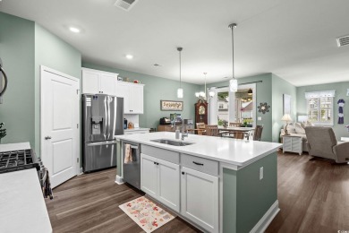 This thoughtfully designed home in The Retreat at Wild Wing on Wild Wing Plantation in South Carolina - for sale on GolfHomes.com, golf home, golf lot