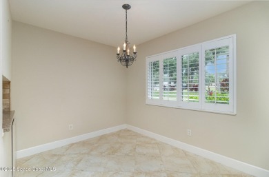 Nestled within a sought-after resort-style country club on Indian River Colony Club in Florida - for sale on GolfHomes.com, golf home, golf lot