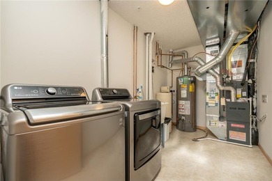 Settle into this beautifully maintained 3-bed, 2-bath townhome on Loggers Trail Golf Club in Minnesota - for sale on GolfHomes.com, golf home, golf lot