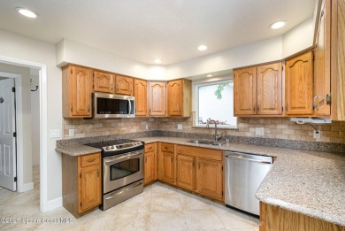 Nestled within a sought-after resort-style country club on Indian River Colony Club in Florida - for sale on GolfHomes.com, golf home, golf lot