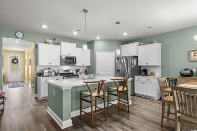 This thoughtfully designed home in The Retreat at Wild Wing on Wild Wing Plantation in South Carolina - for sale on GolfHomes.com, golf home, golf lot