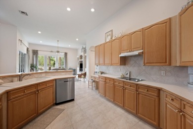 Spacious 5-bedroom, 3-bathroom pool home in the exclusive on The Wanderers Club in Florida - for sale on GolfHomes.com, golf home, golf lot