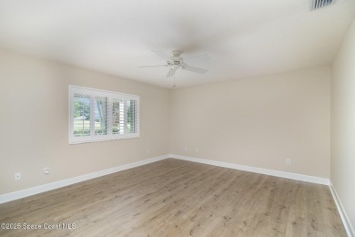 Nestled within a sought-after resort-style country club on Indian River Colony Club in Florida - for sale on GolfHomes.com, golf home, golf lot